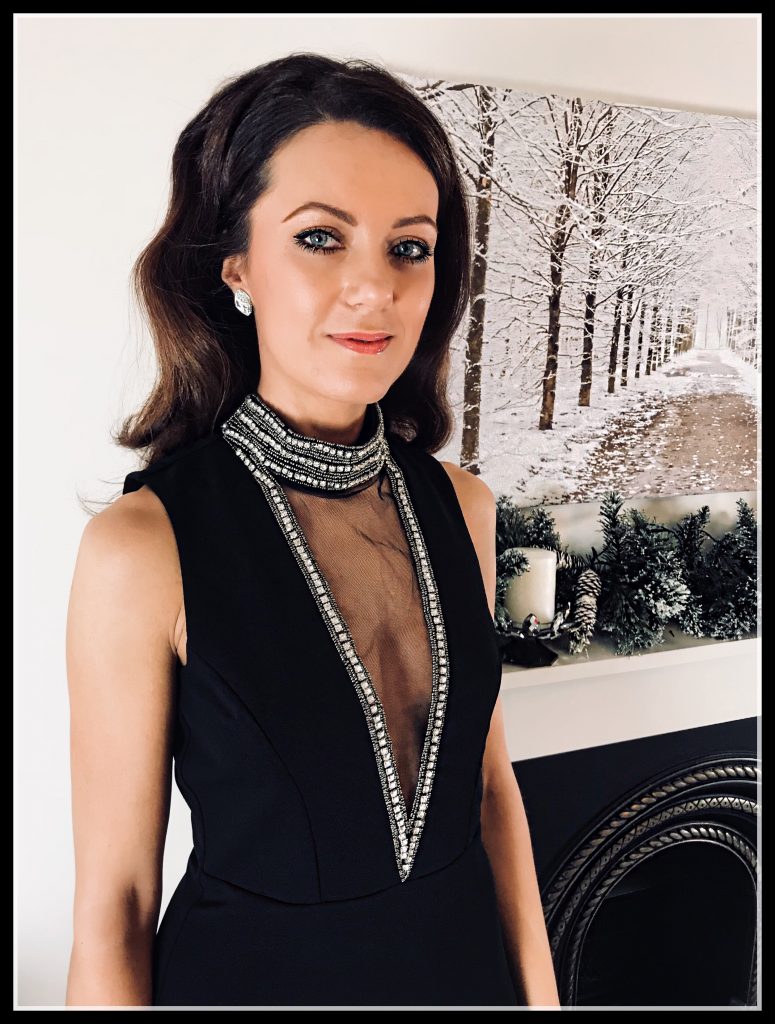 Stephanie Pratt – Goddiva High Neck Cut Out Embellished Maxi Dress | River Island Gold Bow Court | Miss Kg Tutu Glitter Blow Clutch | Swarovski earrings