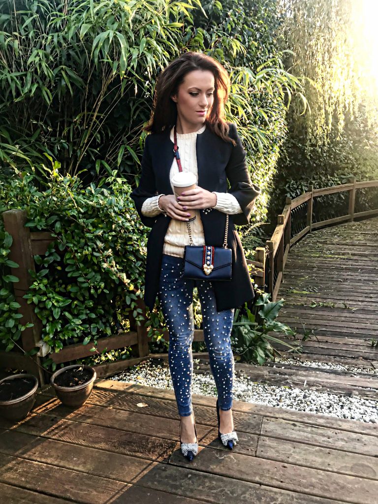 KG by Kurt Geiger Bow Pearl Detail Court Shoes, ALDO Pearl Detail Mini Cross Body Bag, Ralph Lauren Cable-Knit Crewneck Sweater and a pearl detail jacket from Zara.