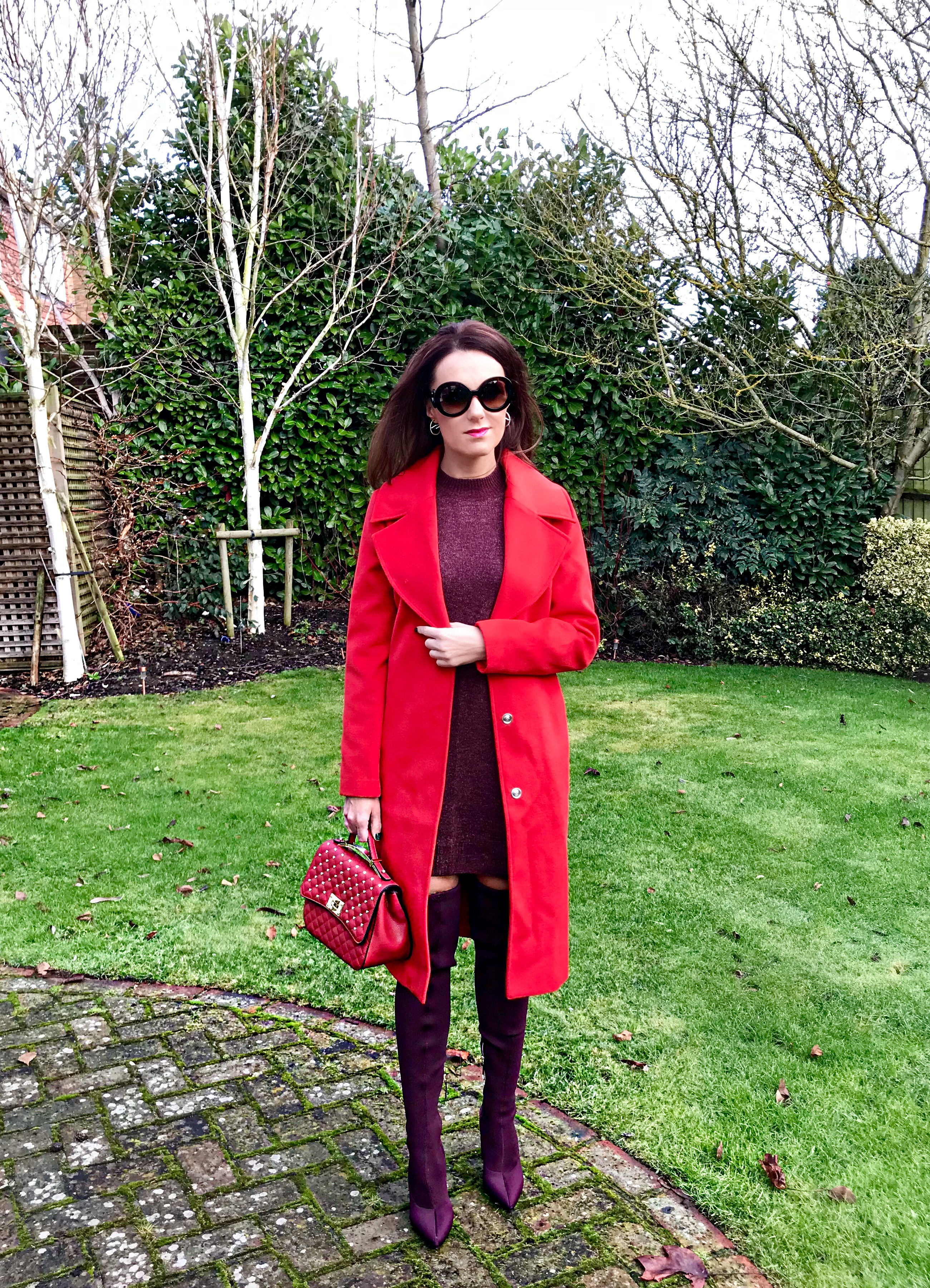Miss Selfridge Smart Midi Coat | V by Very Quilt and Stud Satchel | River Island River Island Knitted Over The Knee Boots- Dark Red | Abercrombie & Fitch Burgundy Long Sleeve Knit Dress Shades of Valentine | Red long coat & Burgundy boots | Swarovski earrings | Baroque Prada sunglasses