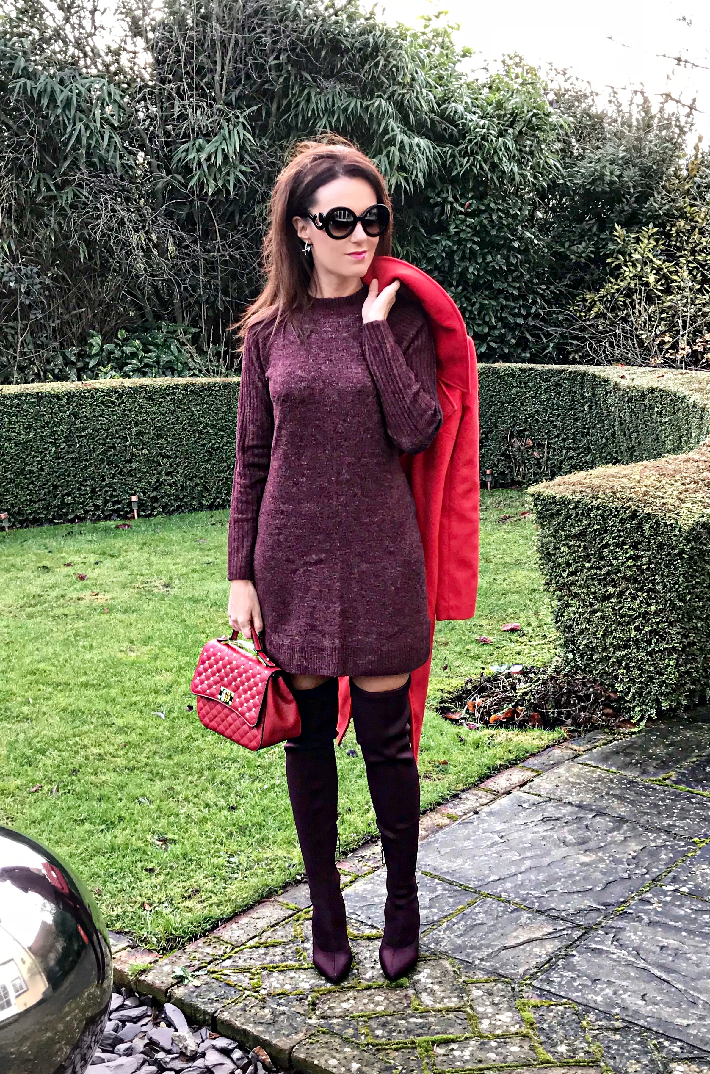 Miss Selfridge Smart Midi Coat | V by Very Quilt and Stud Satchel | River Island River Island Knitted Over The Knee Boots- Dark Red | Abercrombie & Fitch Burgundy Long Sleeve Knit Dress Shades of Valentine | Red long coat & Burgundy boots | Swarovski earrings | Baroque Prada sunglasses