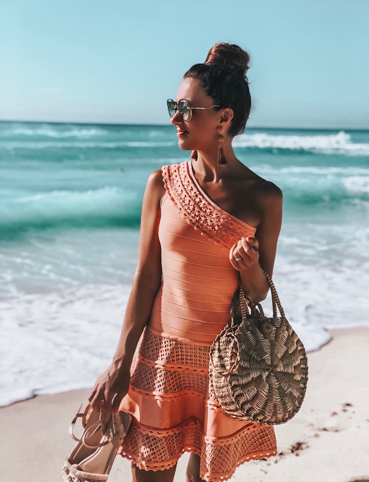 Cancun Mexico | Secrets the Vine hotel Forever Unique Structured One Shoulder Skater Dress With Lace Inserts | Glamorous Pearl Embellished Satin Sandals | Swarovski hoop earrings | Miu Miu sunglasses | ASOS DESIGN Wrapped Bead & Tassel Earrings | South Beach Round Gold Woven Straw Cross Body Bag