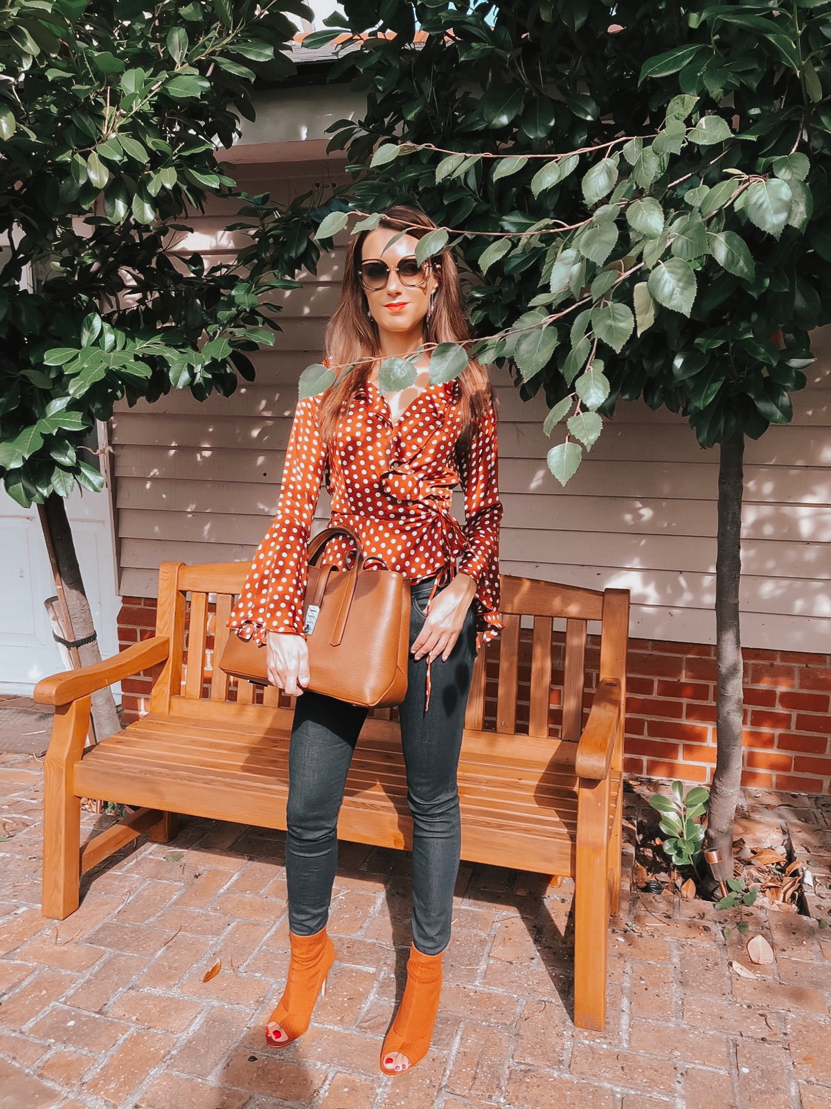 Miu Miu Sunglasses | Replay Luz Mid Rise Rinse Jeans with Contrast Stitch | Glamorous Print Wrap Front Top | Swarovski Chain Pierced Earrings | V by Very Finchley Knitted Peep Toe Shoeboot | Hugo Boss Boss Veronika Leather Tan Tote Bag