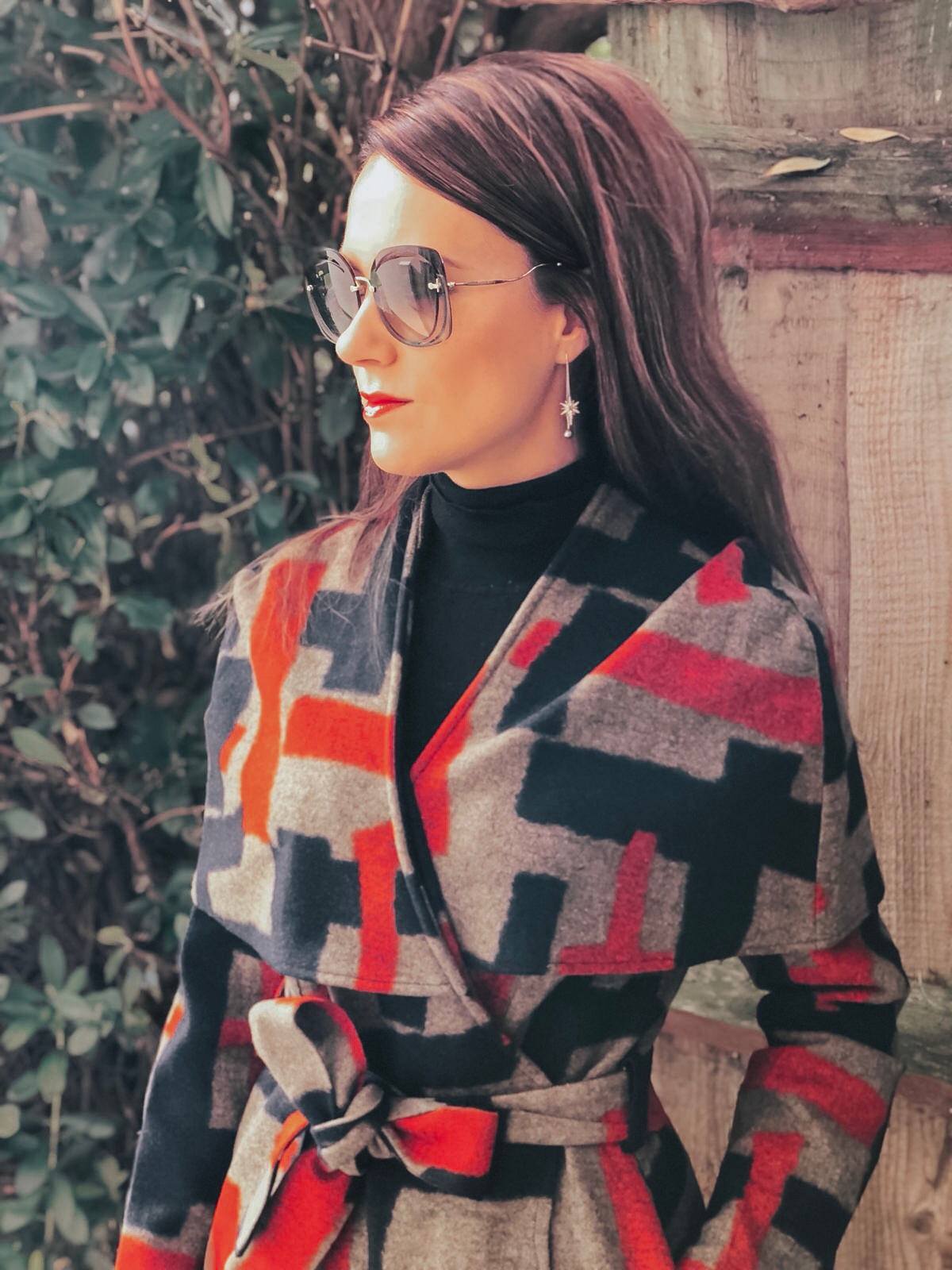 Lavish Alice cape overlay wool coat in abstract print | Faith Buckle Detail Stiletto Boots | Miu Miu Sunglasses | Valentino Red Tote Daybags | Swarovski FANTASTIC CHAIN PIERCED EARRINGS, WHITE | Faith Buckle Detail Stiletto Boot | Replay Luz Mid Rise Rinse Jeans with Contrast Stitch
