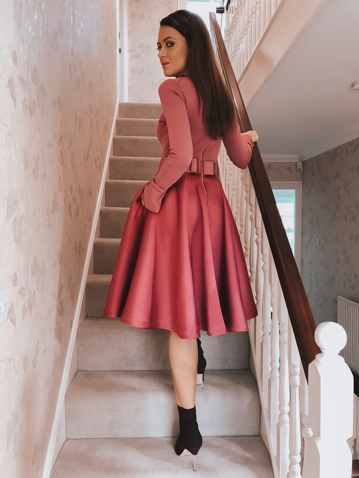 Elegant Duchess Fashion Ted Baker Pink Zadi Skater Dress | Kurt Geiger London Barbican-Wine-(Fabric) Knit Ankle Boot | Miu Miu Sunglasses | Swarovski earrings | Accessorize clutch bag