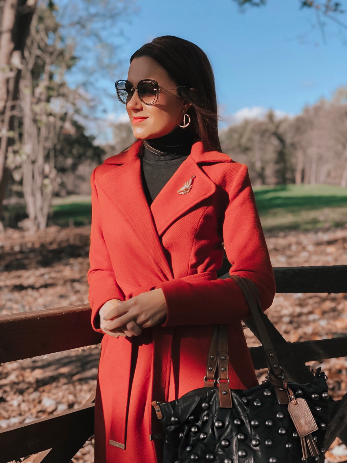 Lipsy Rust Wrap Coat | Elegant Duchess Boutique Brooch | Replay Jeans | Miu Miu sunglasses | Swarovski earrings | Heine Lace-Up Ankle Boots | Suri Frey Sandy Shopper