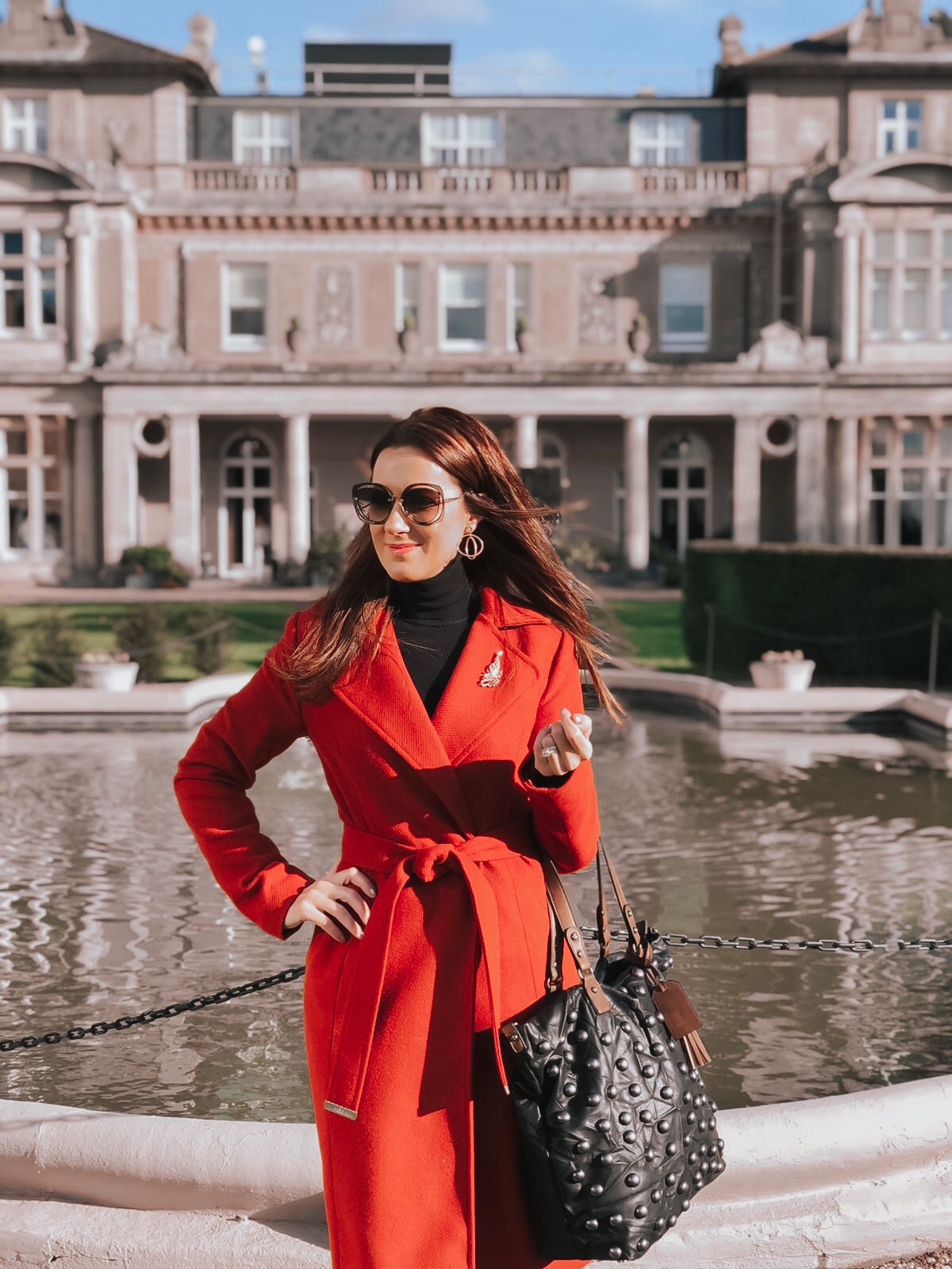 Lipsy Rust Wrap Coat | Elegant Duchess Boutique Brooch | Replay Jeans | Miu Miu sunglasses | Swarovski earrings | Heine Lace-Up Ankle Boots | Suri Frey Sandy Shopper