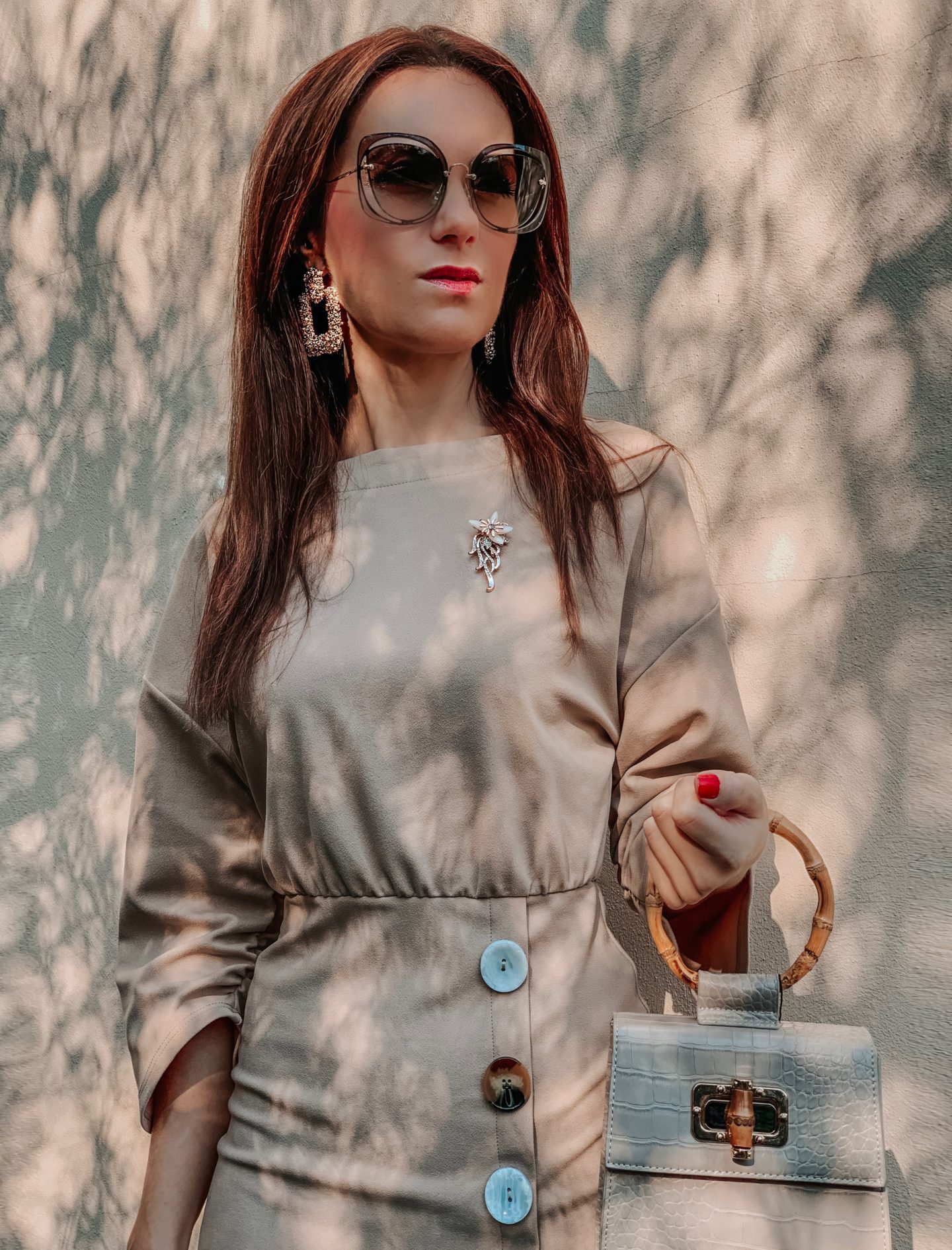 ASOS DESIGN batwing shell button pencil dress | Liars & Lovers cream mock croc bamboo handle cross body bag | Carvela Pointed Asymmetric Strap Heels | MIU MIU Scenique cut-out eyewear | Zara TEXTURED GEOMETRIC EARRINGS | Elegant Duchess Boutique Brooch