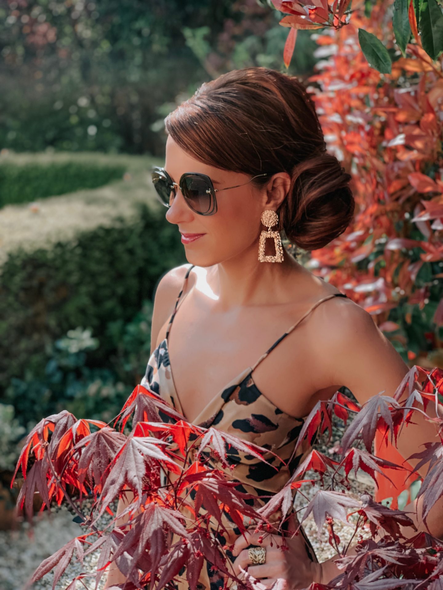 Forever Unique Leopard Print Wide-Leg Jumpsuit | Zara square earrings | Miu Miu sunglasses | Charlotte Tilbury make up | River Island Heels | Next Natural Square Shopper Bag