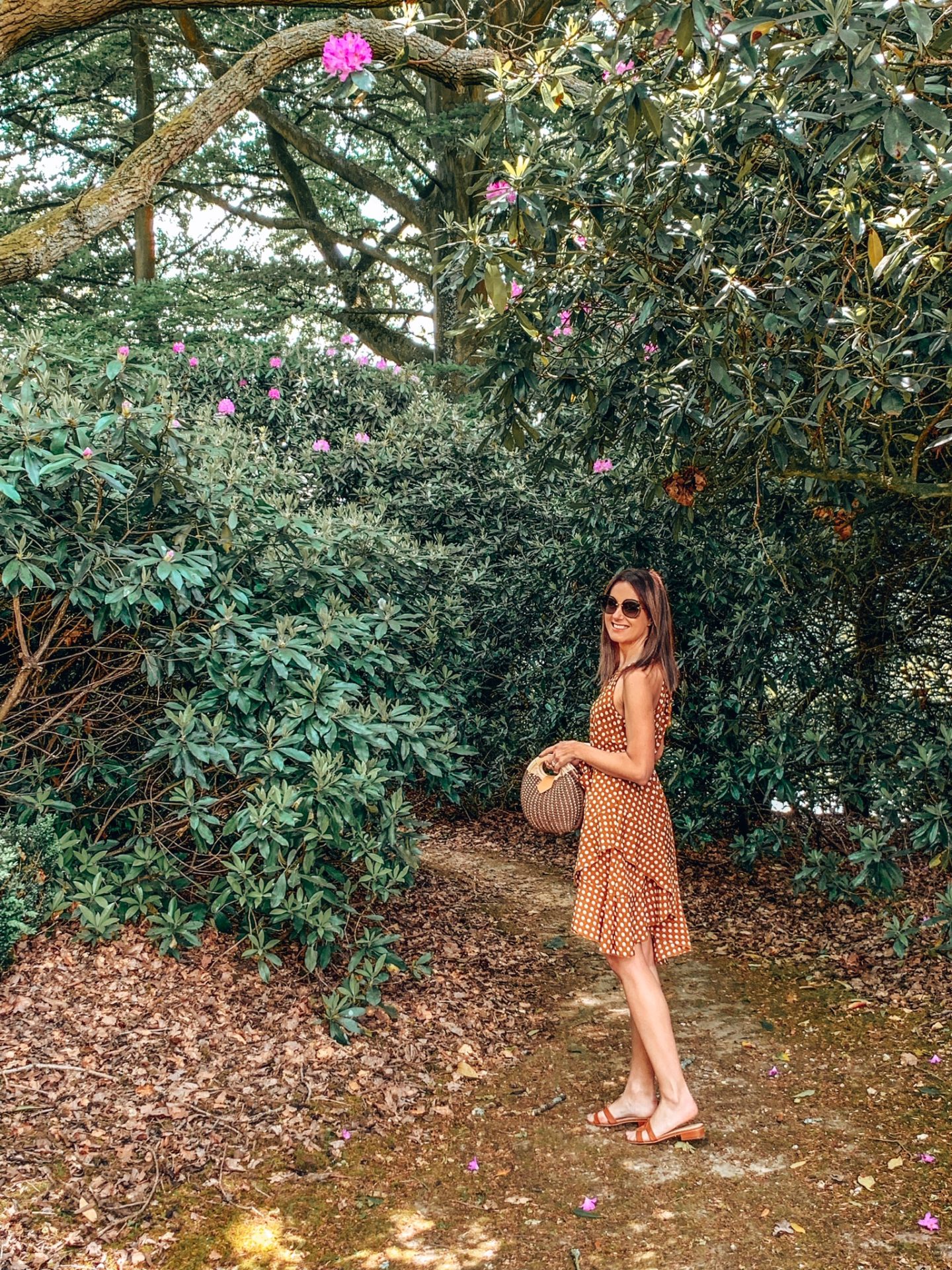 Alexander House | Luxury Five Star Hotel & Spa in West Sussex | Elegant Duchess Boutique Polka Dot dress and a straw bag