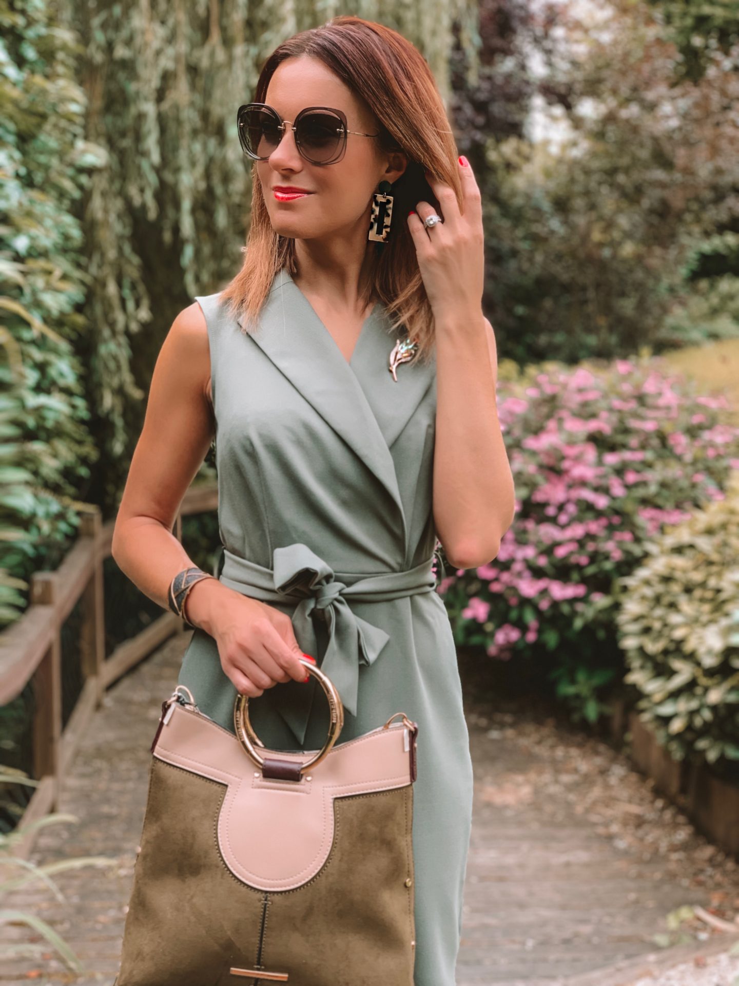 Closet London Khaki Collared Midi Pencil Dress | Elegant Duchess Boutique brooch | Miu Miu sunglasses | River Island Bag