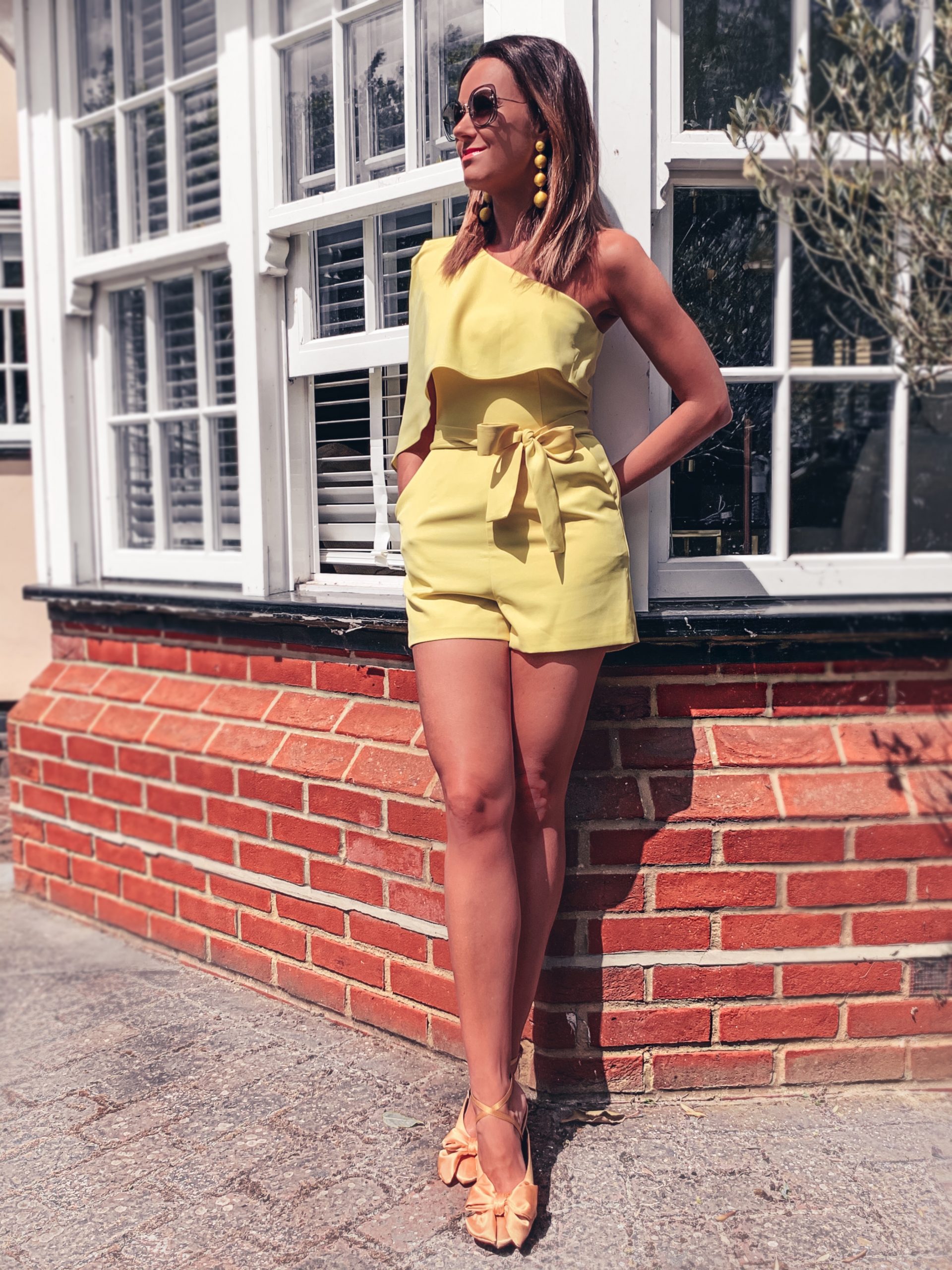 SUMMER OUTFITS, COLD SHOULDER PASTEL YELLOW PLAYSUIT | LAVISH ALICE | YELLOW PASTEL DROP EARRINGS | MIU MIU SUNGLASSES