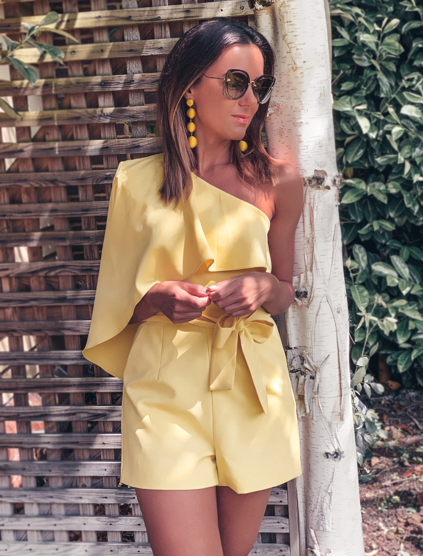 SUMMER OUTFITS, COLD SHOULDER PASTEL YELLOW PLAYSUIT | LAVISH ALICE | YELLOW PASTEL DROP EARRINGS | MIU MIU SUNGLASSES