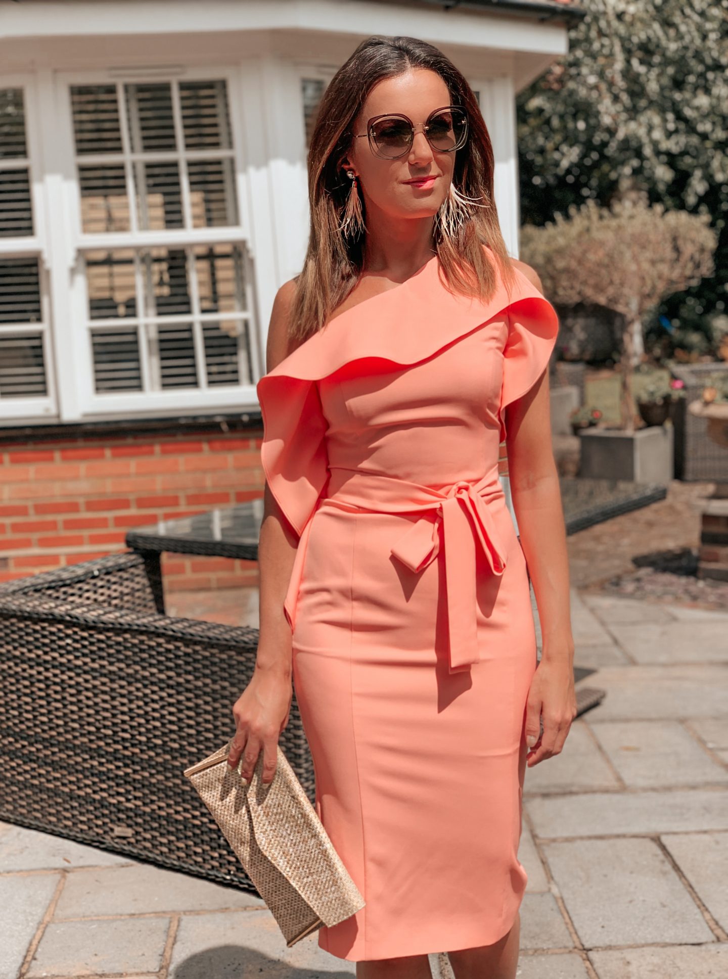 MIDI PASTEL SALMON PINK RUFFLE COLD SHOULDER DRESS | LAVISH ALICE | MIU MIU SUNGLASSES | TASSEL PINK EARRINGS