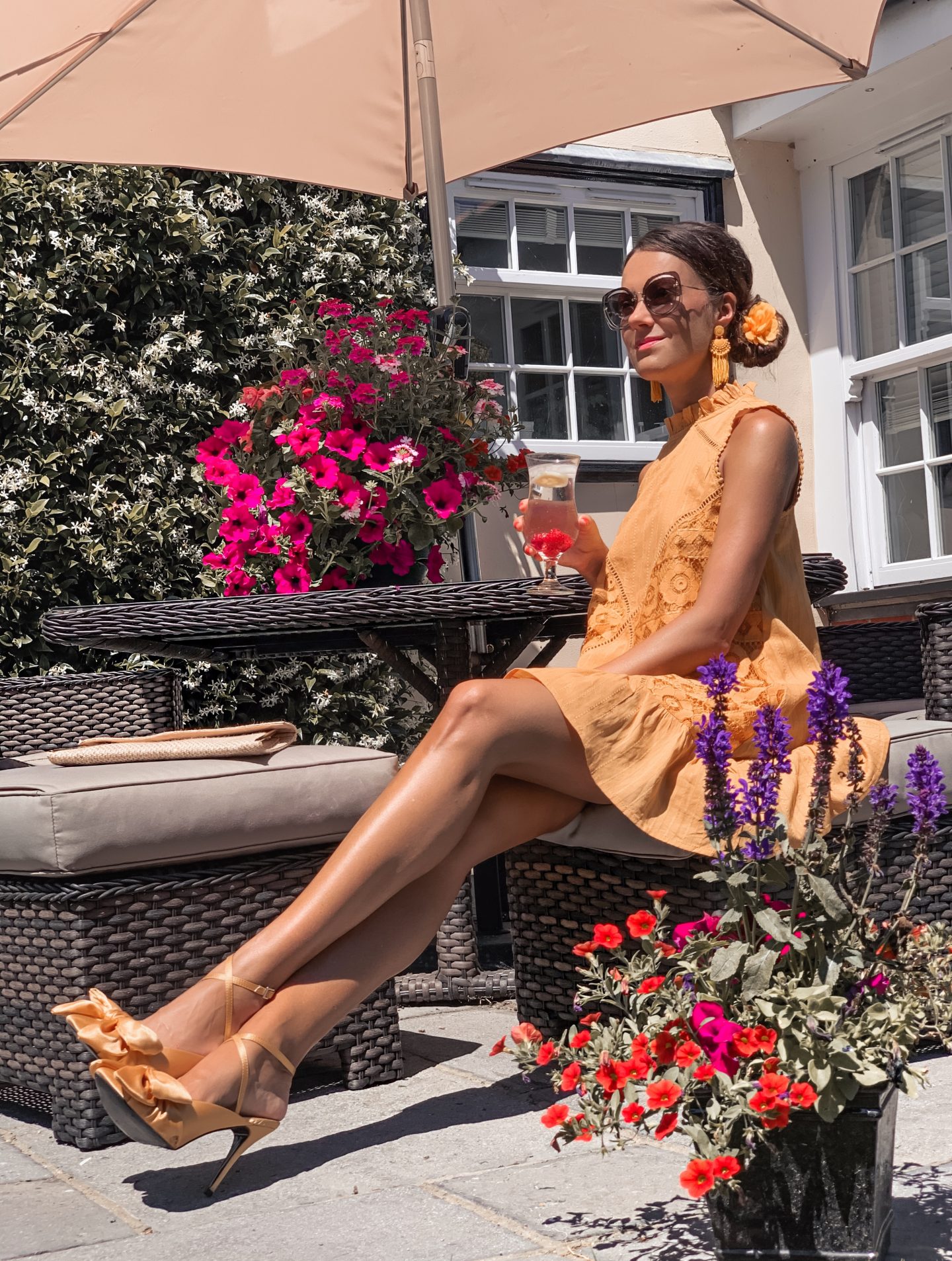 Summer Dress, Sundress, Lace dress, ASOS dress, yellow mini dress | Miu Miu sunglasses | ASOS bow satin yellow shoes | hair flower clip | Charlotte Tilbury make up | tassel yellow earrings