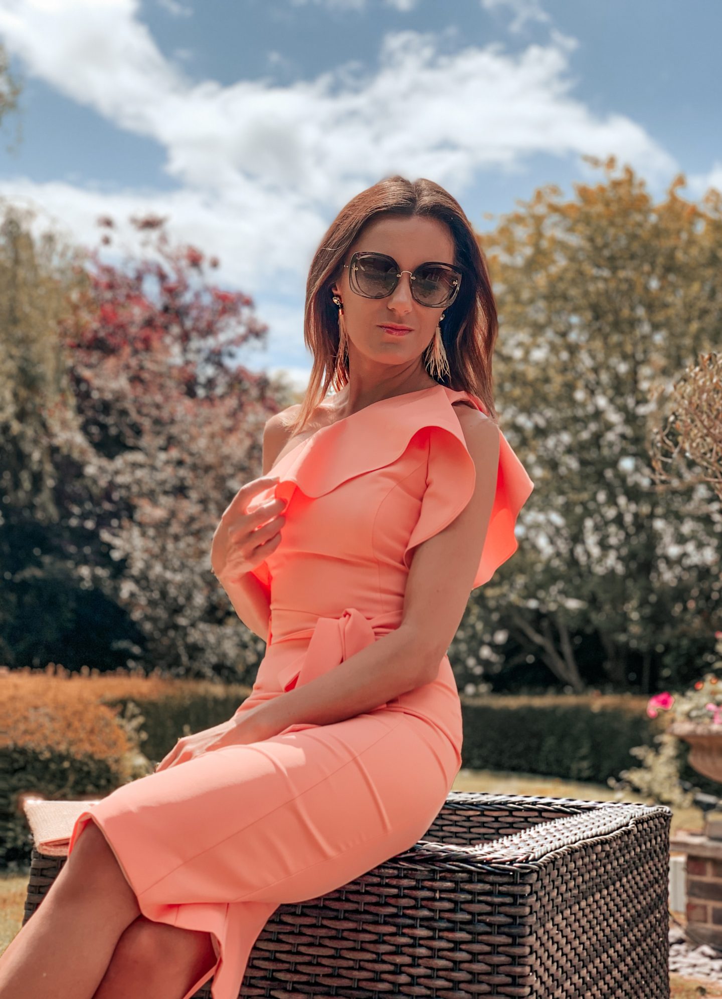 MIDI PASTEL SALMON PINK RUFFLE COLD SHOULDER DRESS | LAVISH ALICE | MIU MIU SUNGLASSES | TASSEL PINK EARRINGS