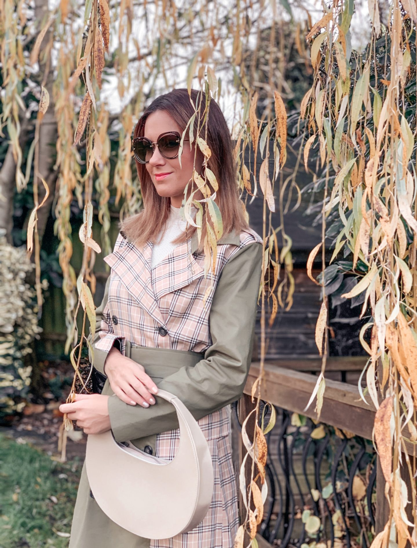 Unique21 mix& match trench in khaki & check | ASOS DESIGN Citrus high-heeled knee boots in khaki and tan mix | ASOS DESIGN smooth curved shoulder bag in beige | Miu Miu sunglasses
