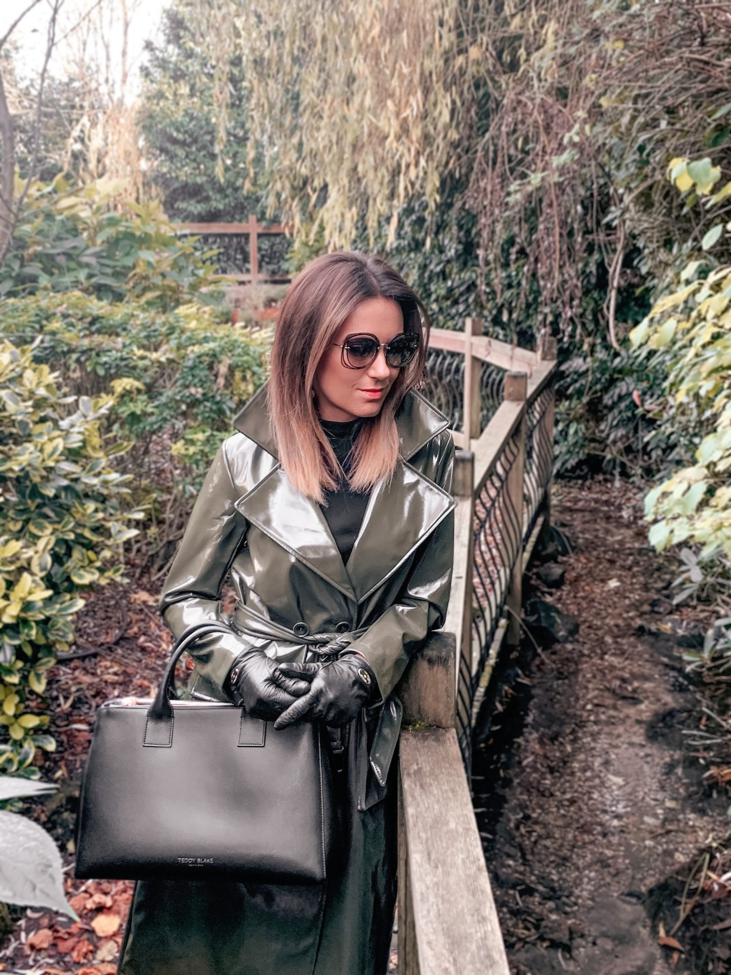 ASOS Urbancode high shine PU belted trench coat in khaki | Mulberry gloves | Miu Miu sunglasses | Teddy Blake Bag |Dune Over the Knee Boots
