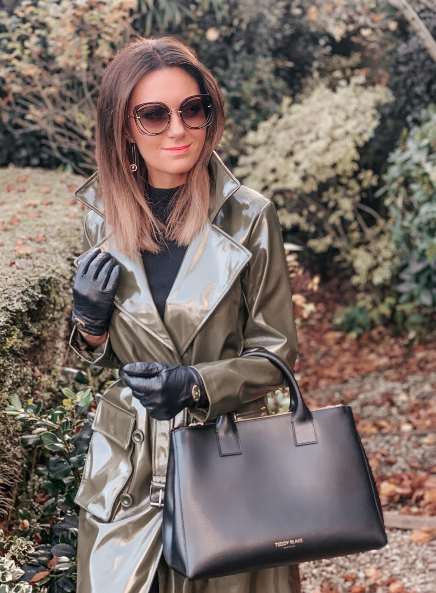 ASOS Urbancode high shine PU belted trench coat in khaki | Mulberry gloves | Miu Miu sunglasses | Teddy Blake Bag