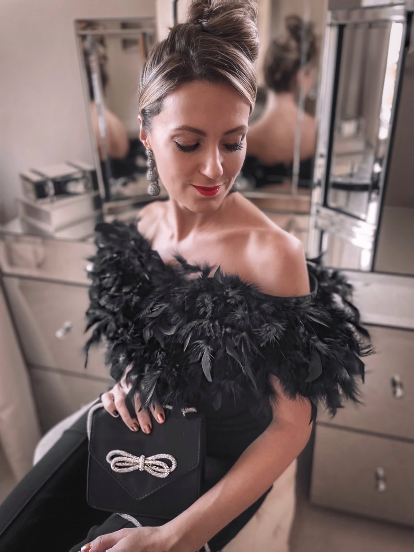 Lipsy Premium Feather Jumpsuit | Dune London Black Bonus Encrusted Heel Courts | ASOS DESIGN envelope shoulder bag with diamante bow in black satin