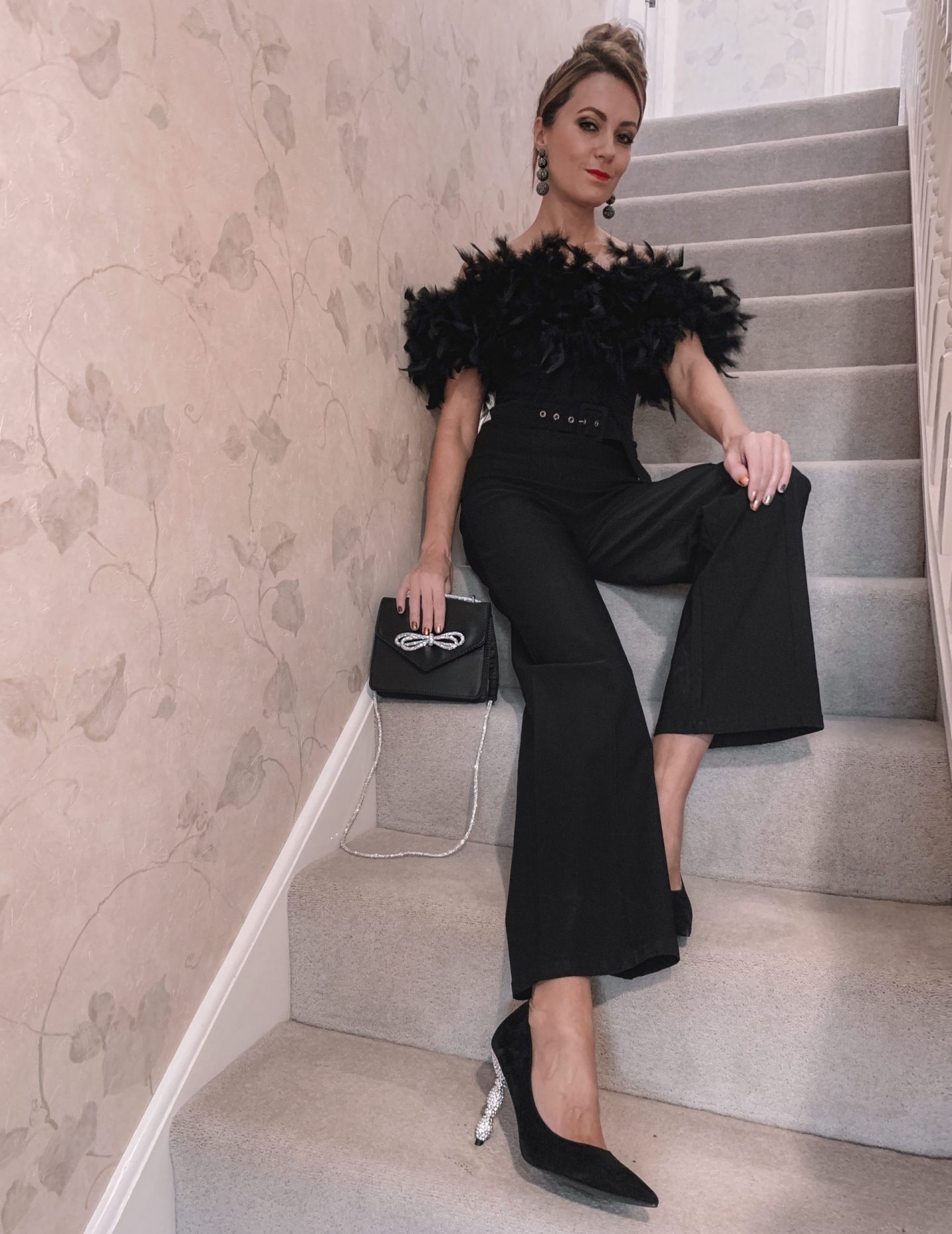 Lipsy Premium Feather Jumpsuit | Dune London Black Bonus Encrusted Heel Courts | ASOS DESIGN envelope shoulder bag with diamante bow in black satin