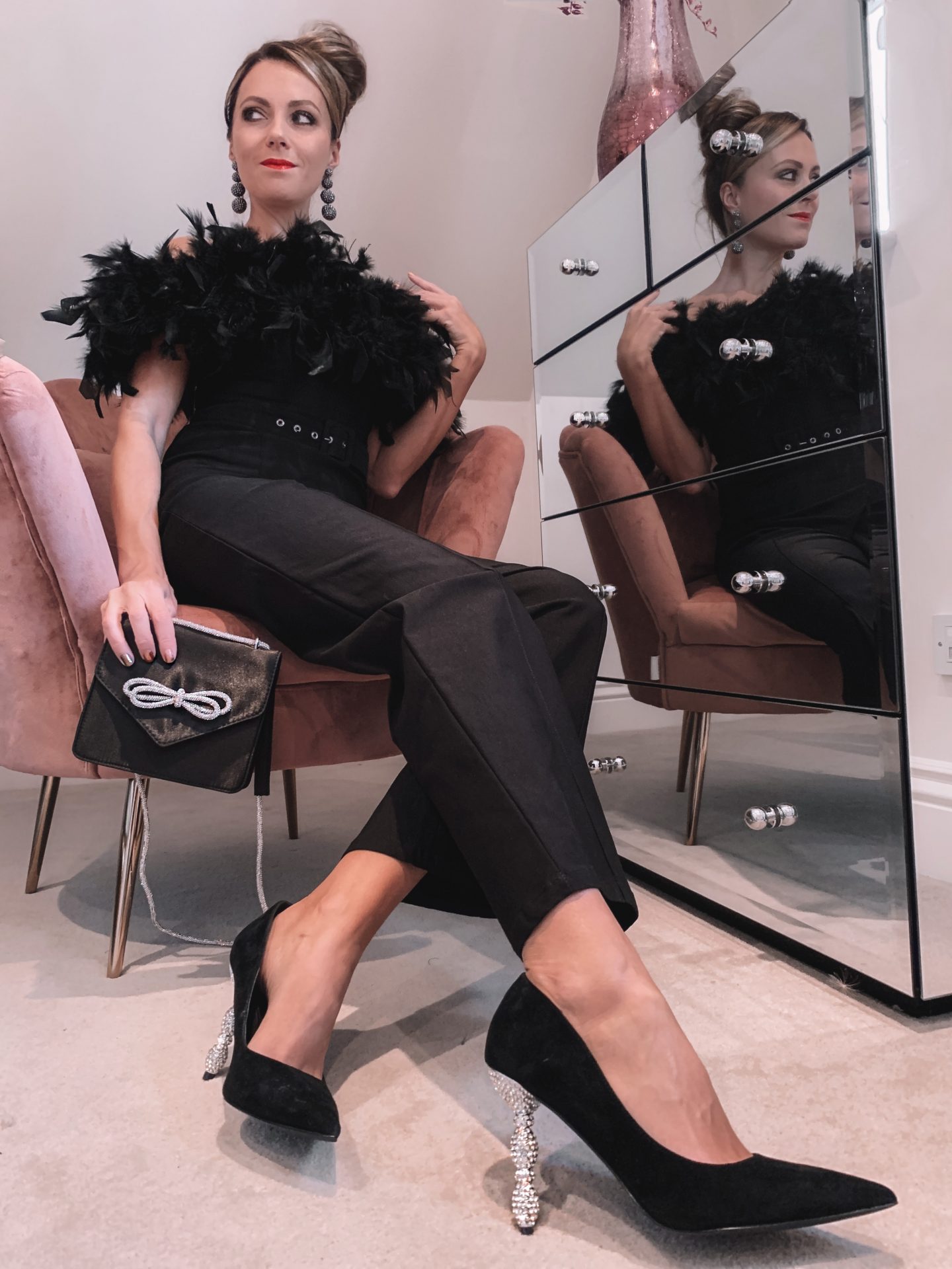Lipsy Premium Feather Jumpsuit | Dune London Black Bonus Encrusted Heel Courts | ASOS DESIGN envelope shoulder bag with diamante bow in black satin