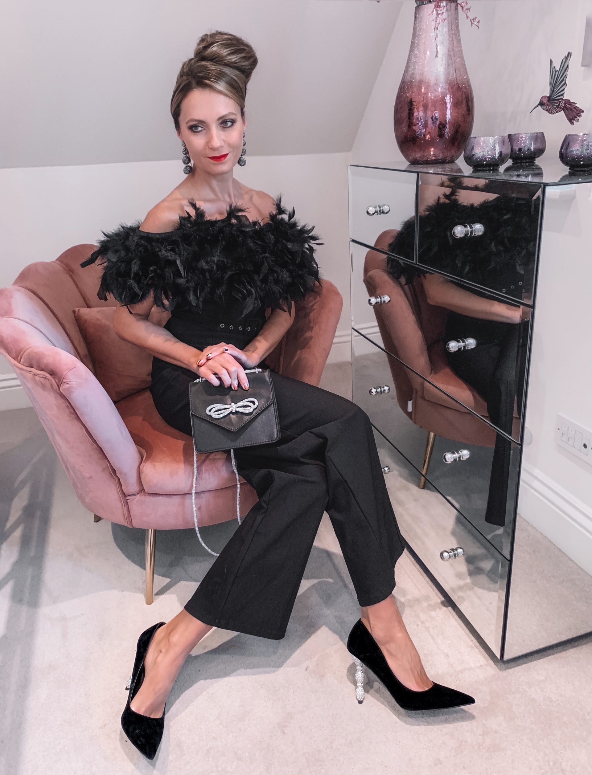 Lipsy Premium Feather Jumpsuit | Dune London Black Bonus Encrusted Heel Courts | ASOS DESIGN envelope shoulder bag with diamante bow in black satin